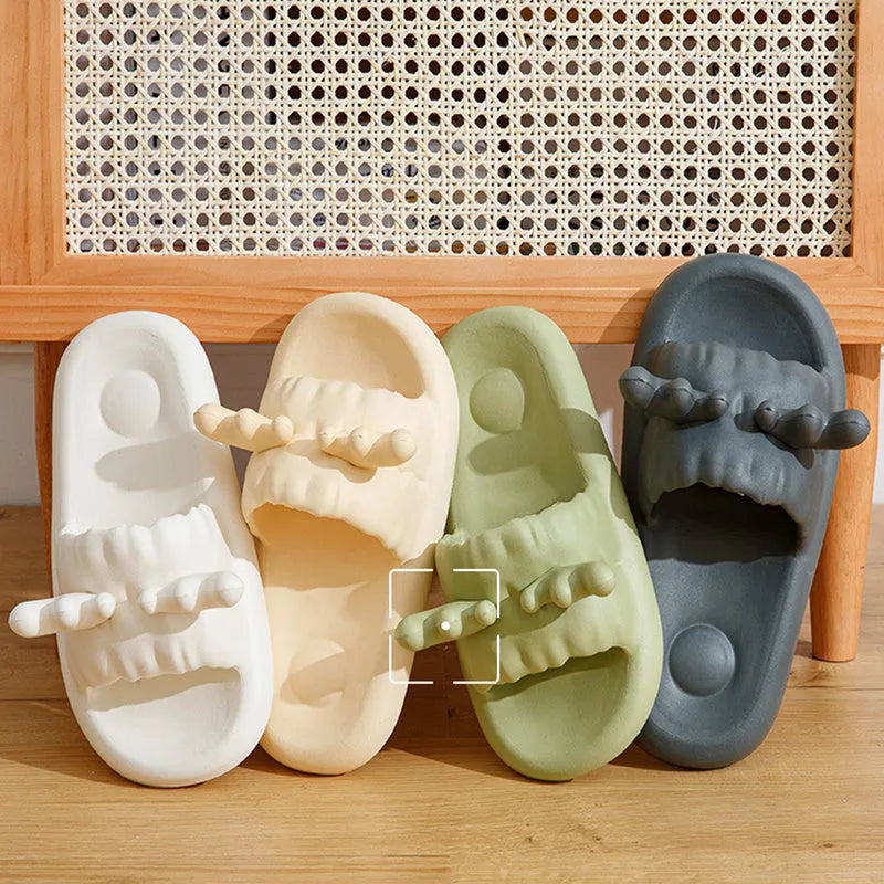 Women's flip-flop style slippers with deer horn design, shown in light yellow on a non-slip EVA sole.