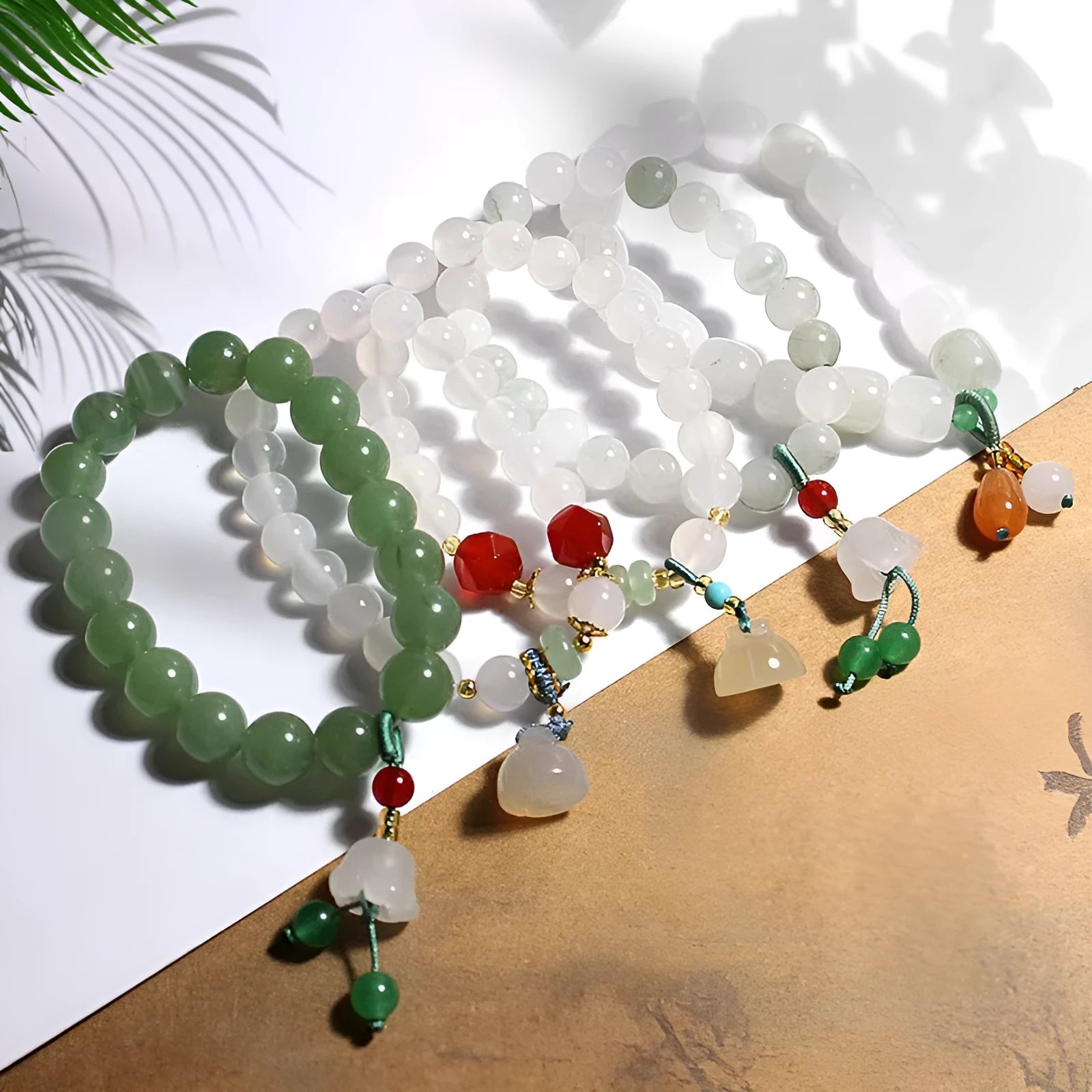 Natural white agate round beads bracelet with lotus seedpod design and Tian Shan Cui old beads
