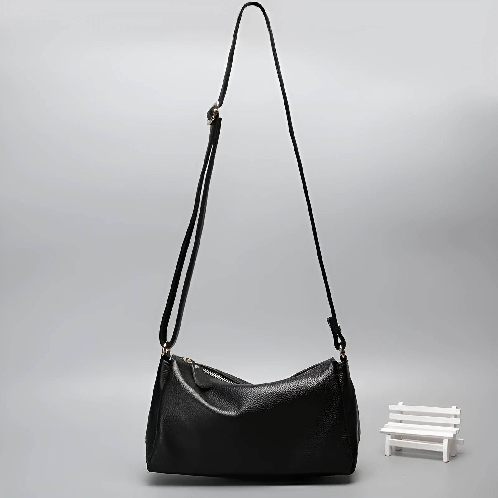 Women's soft genuine leather crossbody shoulder bag in horizontal square shape with strap and handle