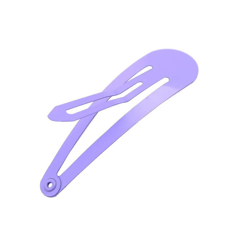 80 piece set of 2-inch metal hair barrettes in 20 different colours, displayed in a zip lock bag.