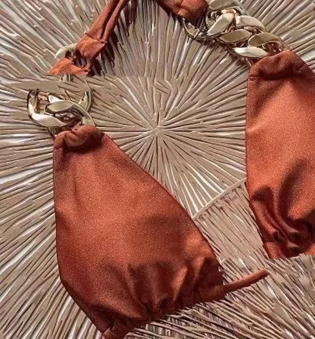 Brown women's tube top bikini swimsuit with an adjustable ring tether and split design.