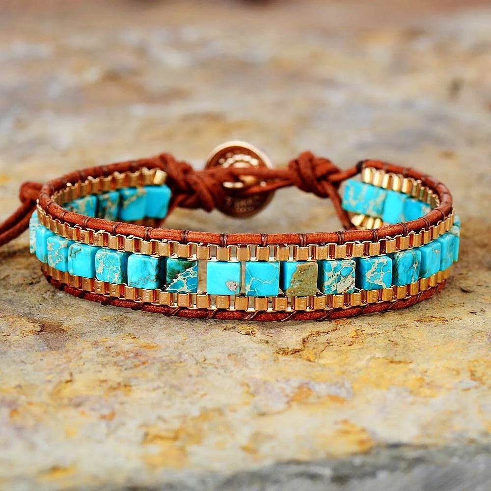 Hand-woven leather bracelet with blue imperial stone accent, geometric design