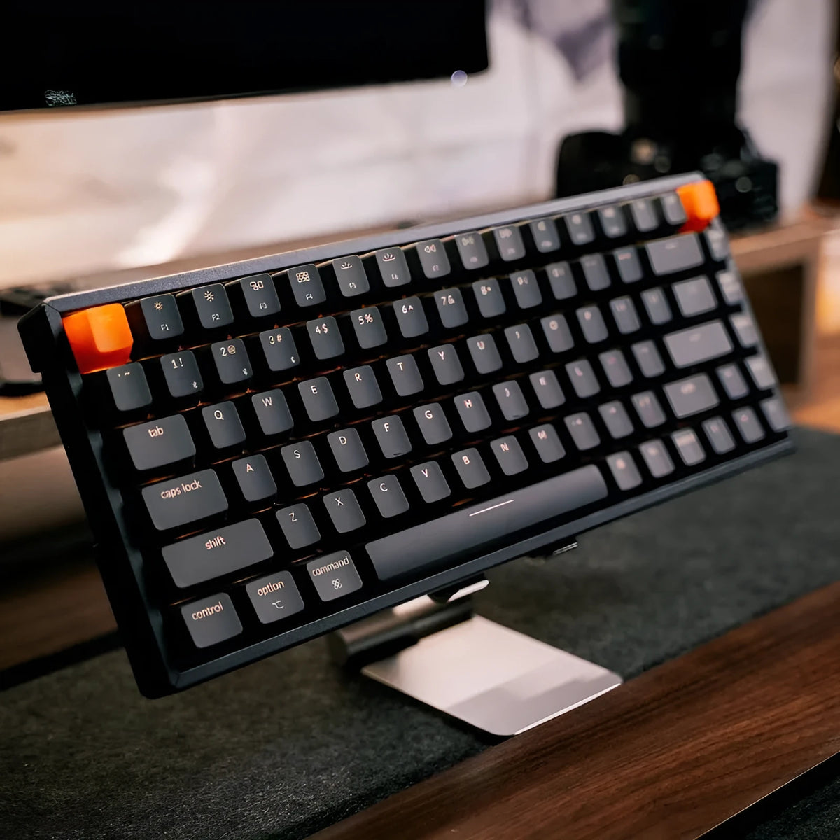 Grey 87-key mechanical keyboard with white backlight, USB and Bluetooth connectivity, compact plastic edge design