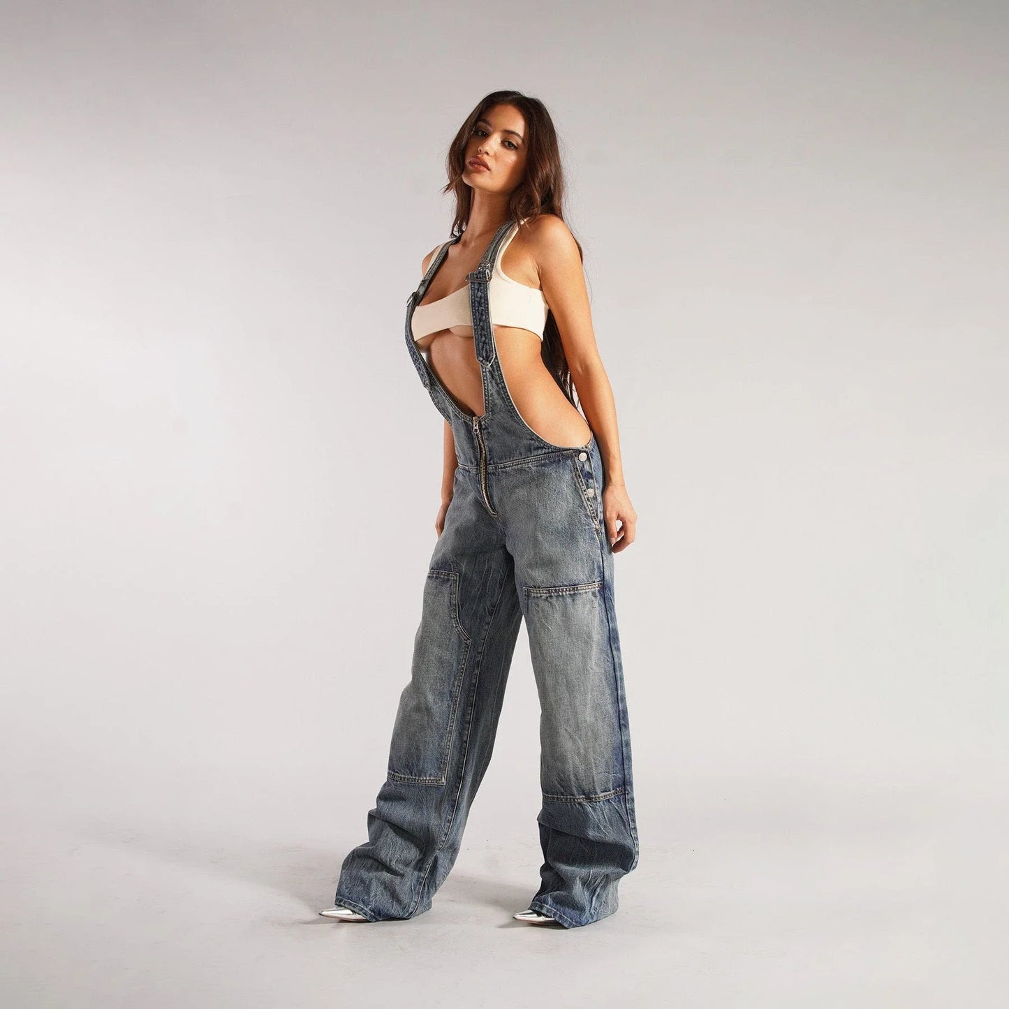 Trendy denim overalls with pockets, featuring a unique Y2K-inspired design, micro-elastic fit, and convenient layout for a stylish and comfortable streetwear look.