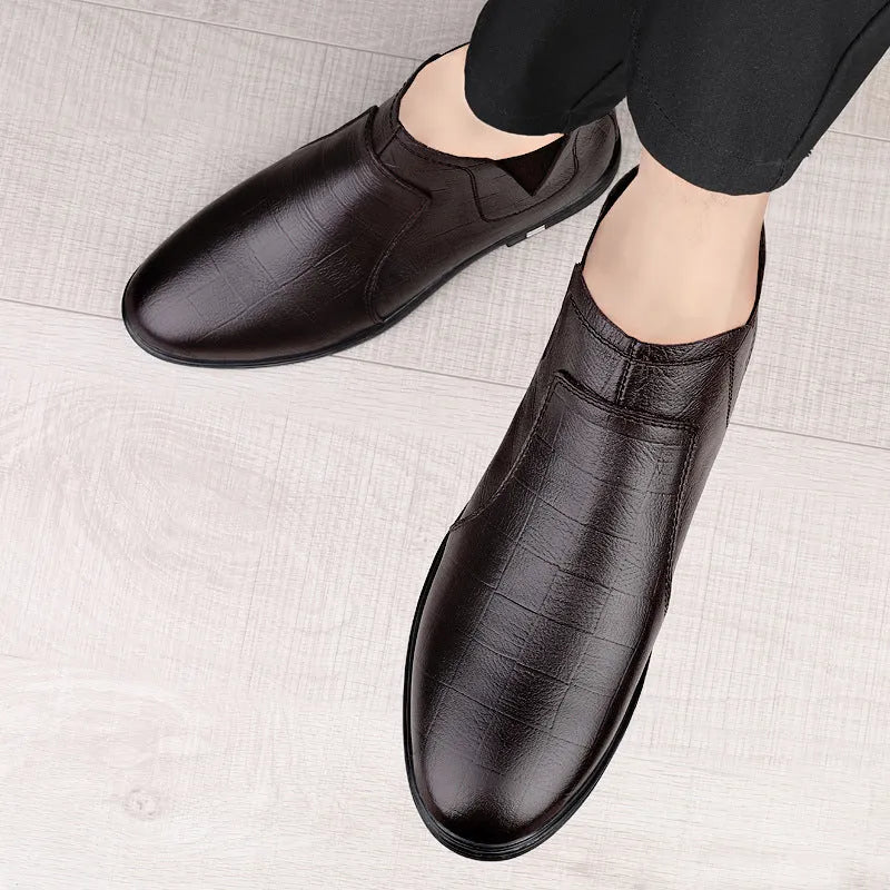 Men's black leather winter boots with round toe, low heel, and fleece lining