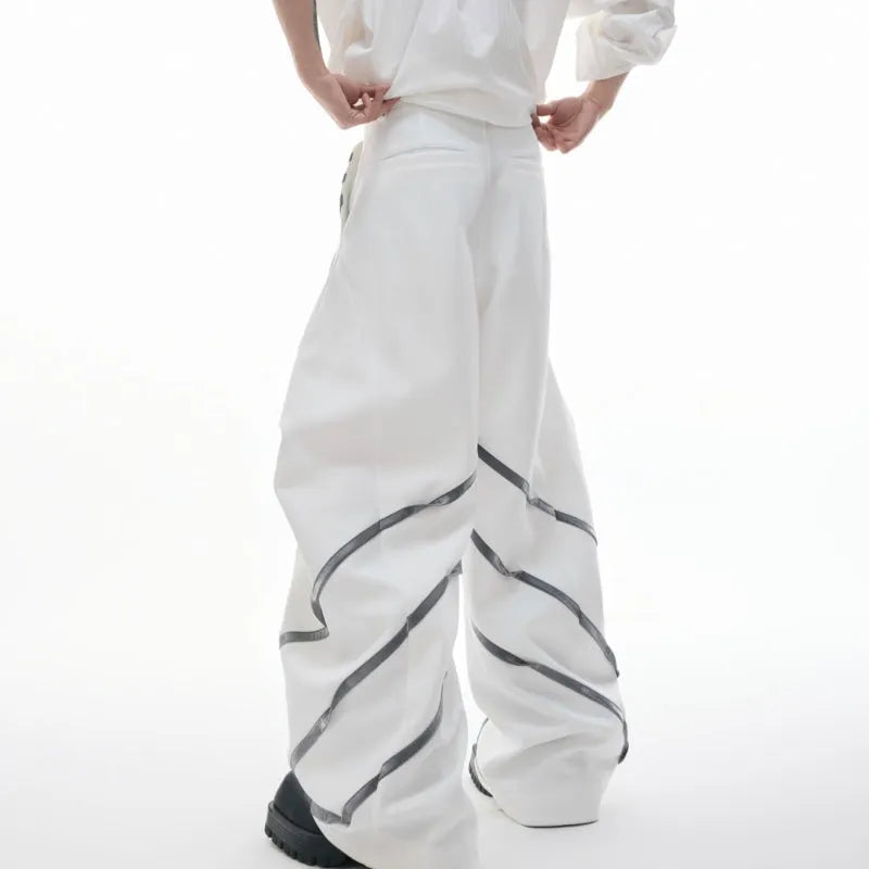 Men's black trousers with metal striped rivet pleats and three-dimensional cutting.