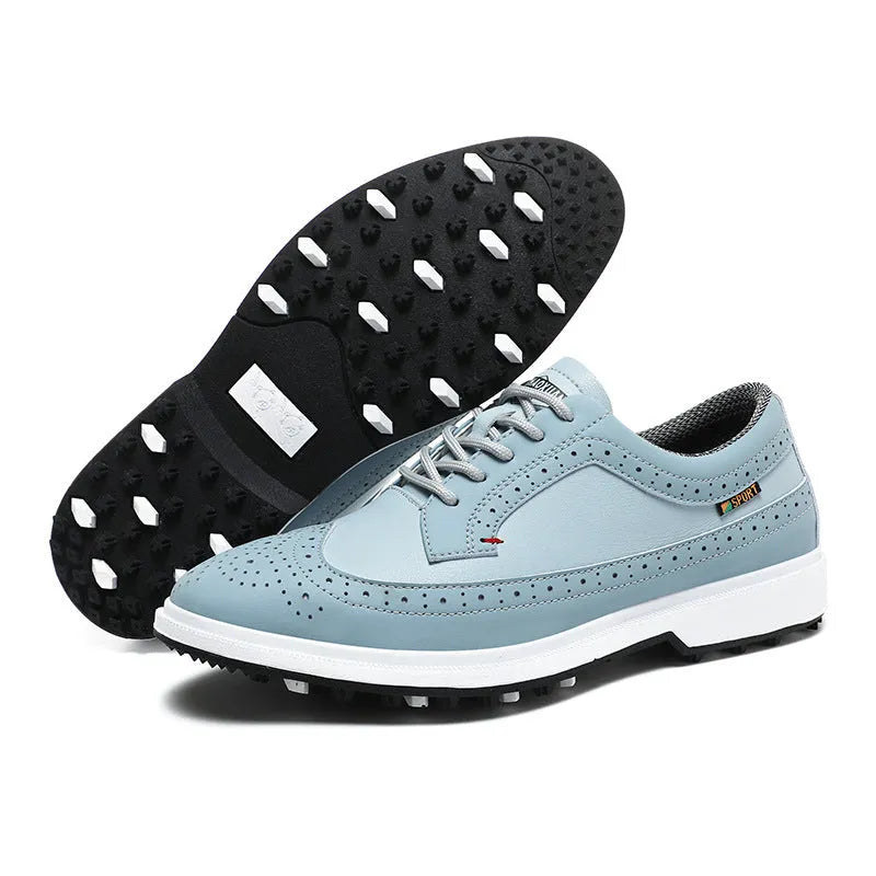 Men's Lake Blue genuine leather golf shoe with non-slip rubber sole on a golf course.