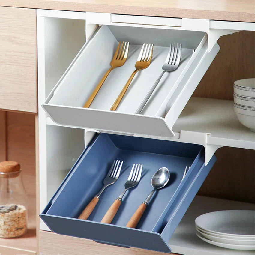 Under cabinet hanging storage box for kitchen utensils in white, green, and blue