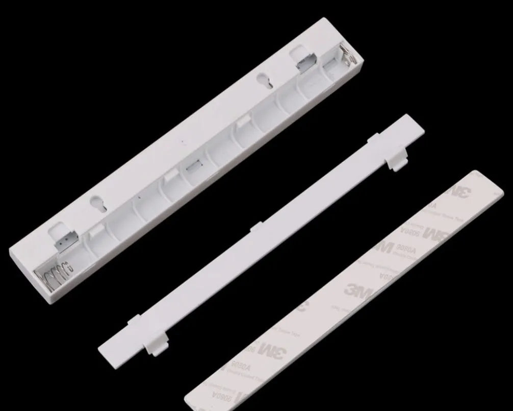 Aluminium magnetic LED closet light with motion sensor on a wardrobe shelf.