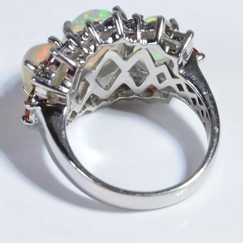 Women's alloy retro geometric ring with zircon inlay on display, available in sizes 6-10