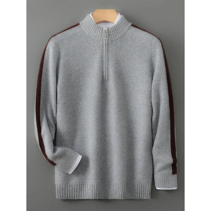 Plus-size model wearing a slim-fit, grey, half-zip wool sweater with a round neckline.