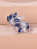 Adjustable copper leaf ring with a zircon stone in a choice of rose gold or platinum finishes.