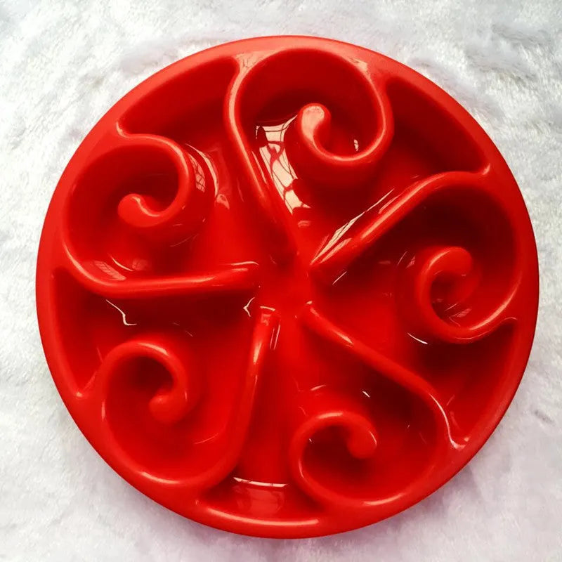 Slow feeder dog bowl with internal maze pattern ridges and a wide non-slip base, shown in blue.