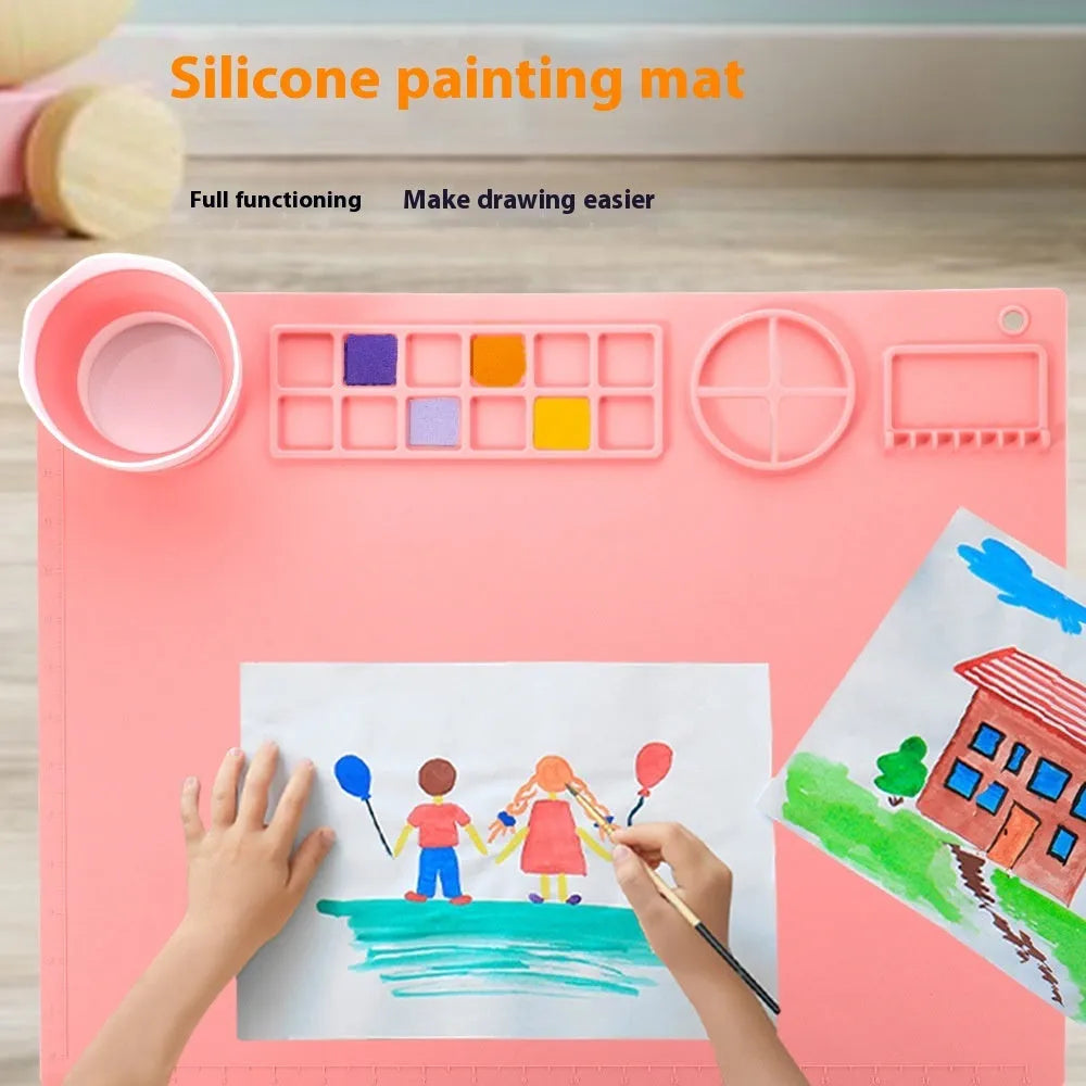 Green silicone painting pad measuring 50x40cm with integrated water bowl for watercolour art