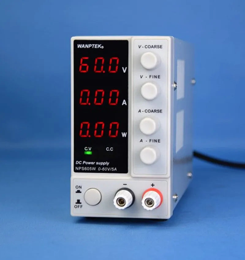 White NPS605W adjustable DC bench power supply with voltage and current dials for electronics repair.