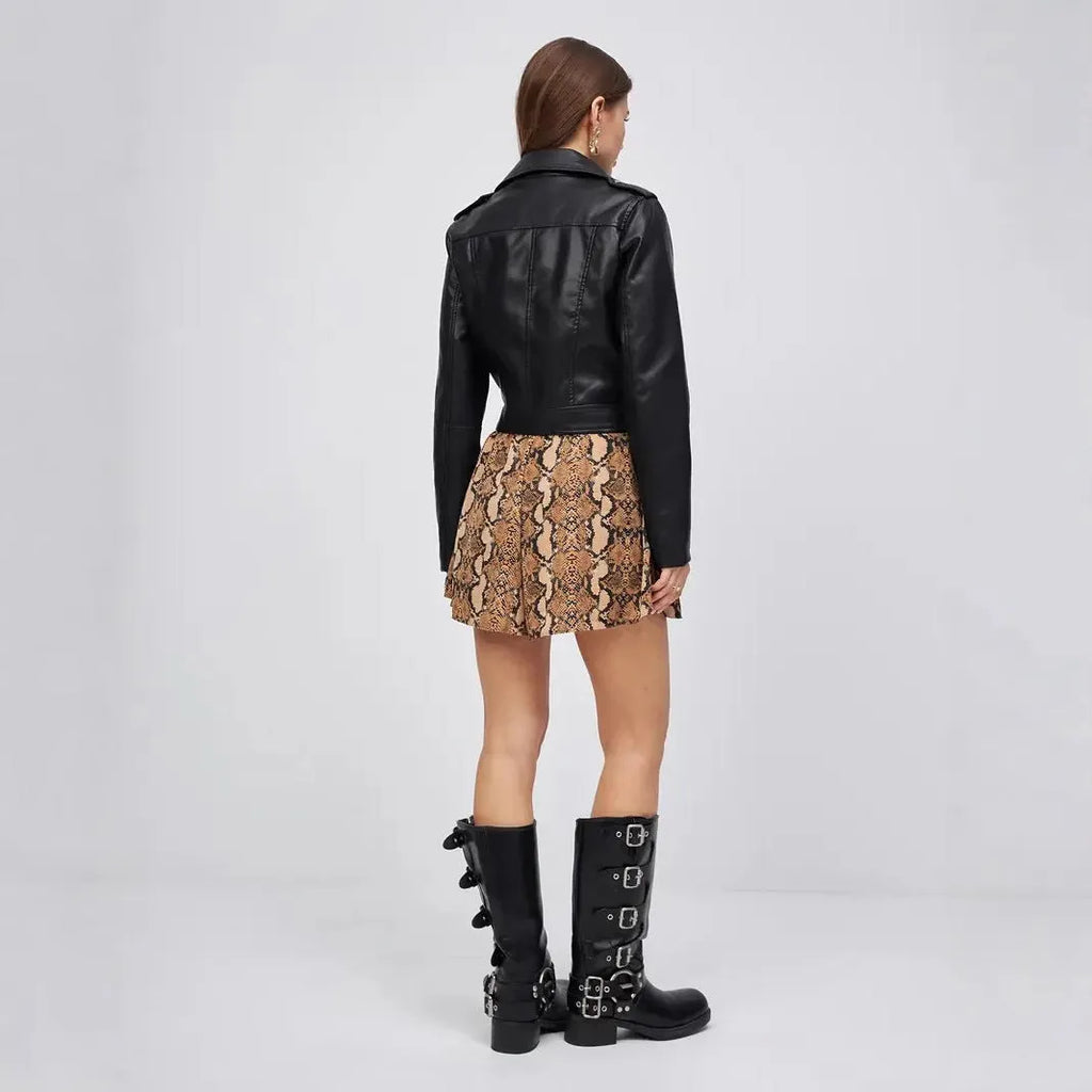 Black women's retro-style imitation leather locomotive jacket with regular sleeves.