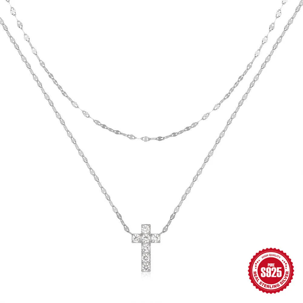 S925 sterling silver double layer twin diamond cross pendant on a clavicle chain.