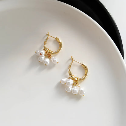 Women's gold pearl tassel earrings with geometric alloy design and electroplated finish, simple drop style for events