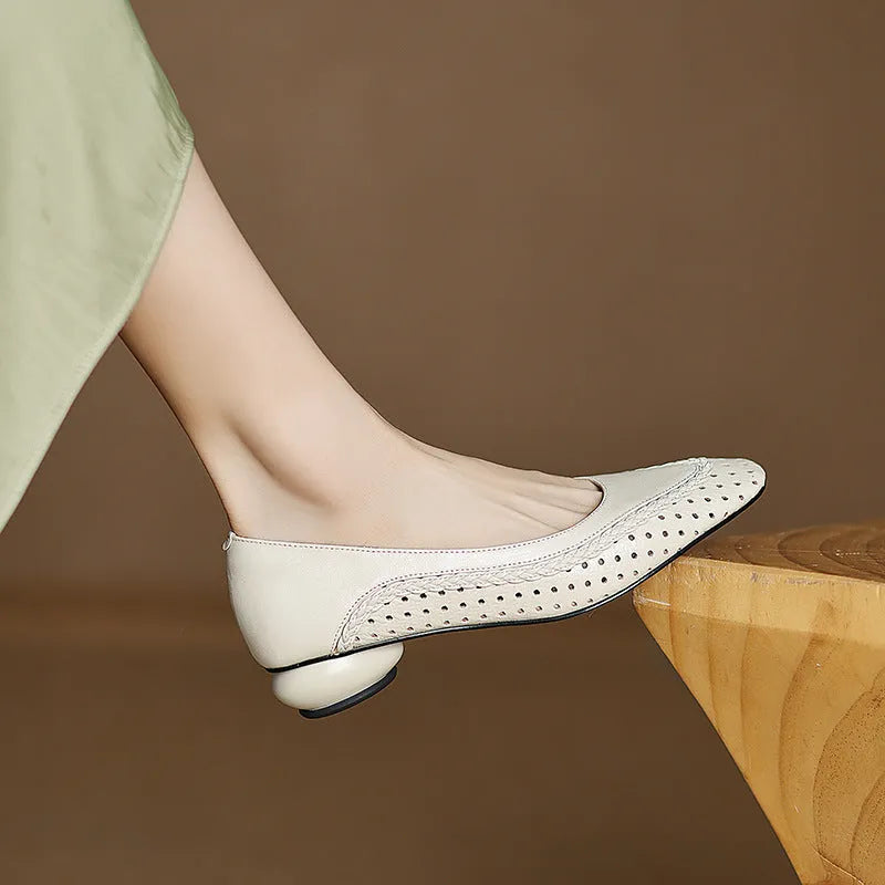 Women's plus size light blue sandals with hollow-out design and mid heel.