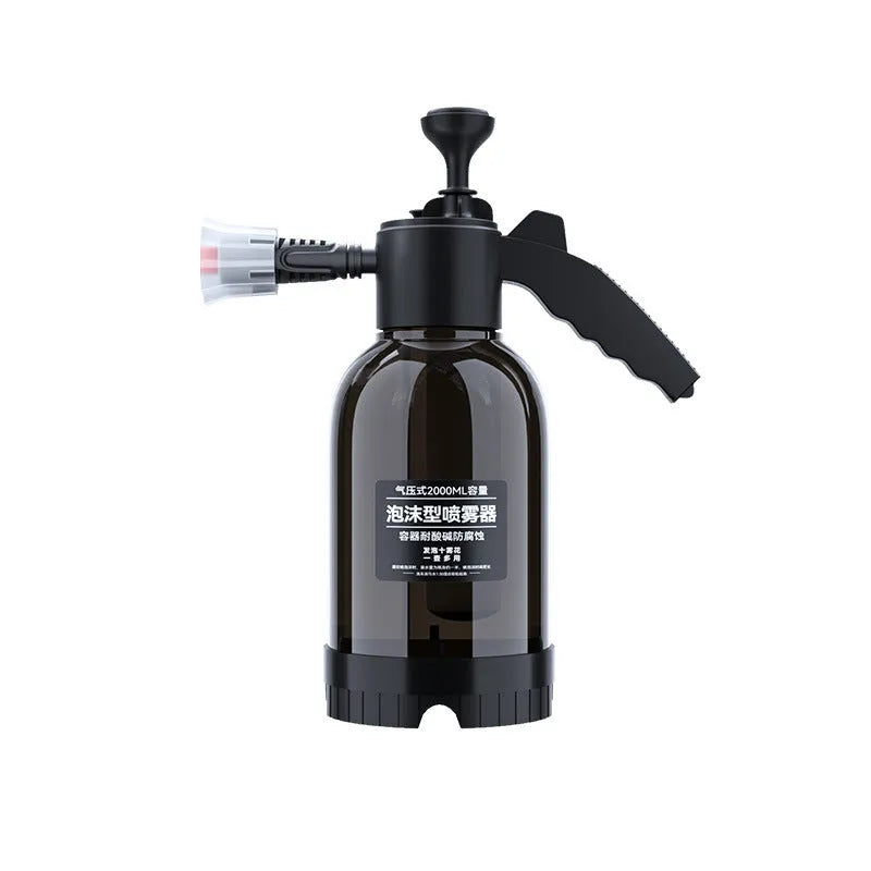 Black 2L hand-held foam watering can sprayer with ergonomic handle and pump mechanism.