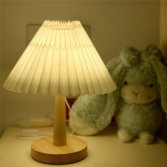 Versatile bedside lamp with dimmable LED light, bamboo base, and pleated fabric shade for New Zealand homes