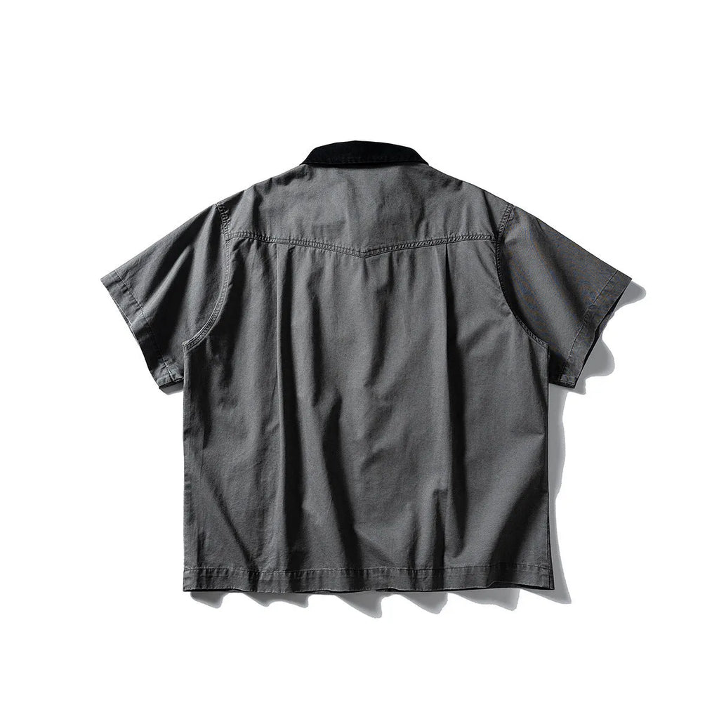 Men's khaki cotton short-sleeve loose-fit overalls cardigan shirt on a hanger