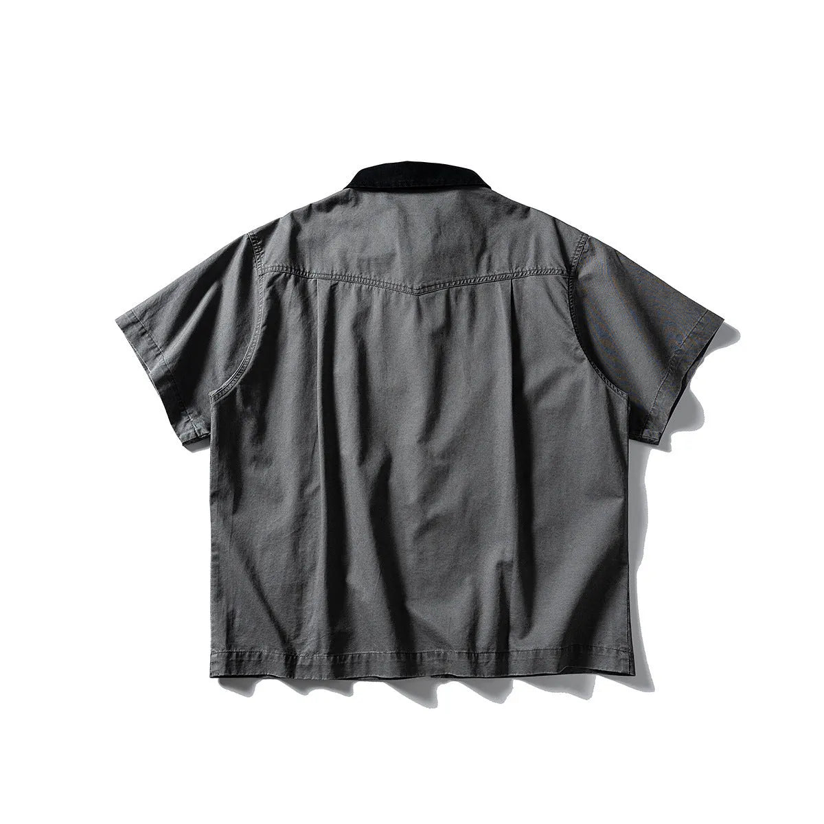 Men's khaki cotton short-sleeve loose-fit overalls cardigan shirt on a hanger