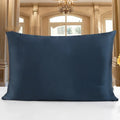 19 M double-sided silk pillowcase shown in one of 14 colours, including apricot, champagne, and navy blue.