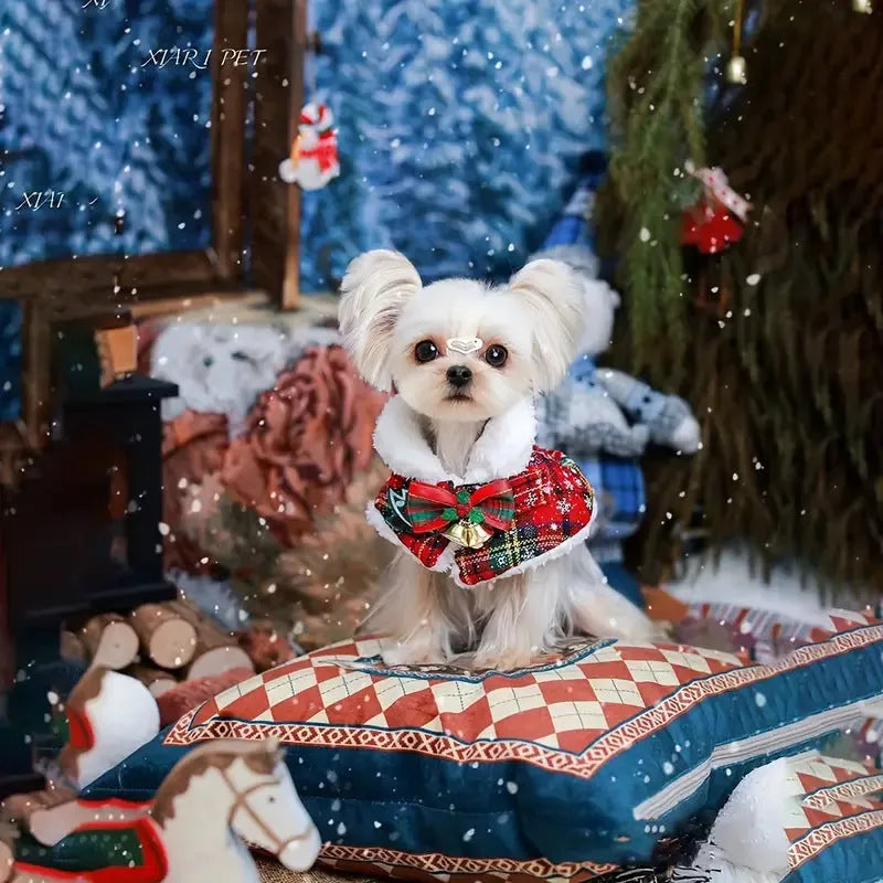 A red background festive bell design polyester scarf for a dog around its neck.