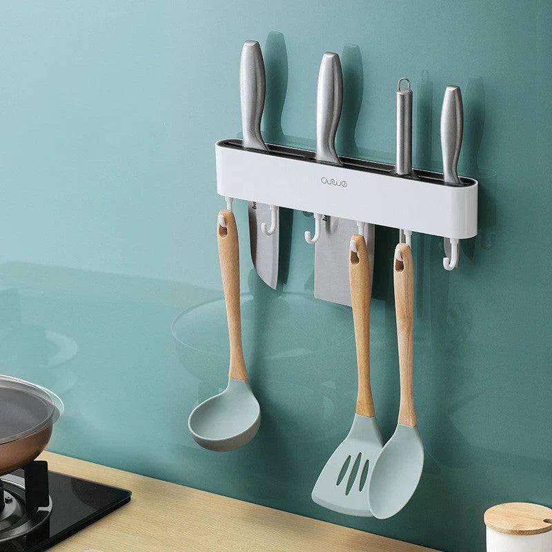 Wall-mounted knife holder in grey and black, holding 4 knives and 6 utensils