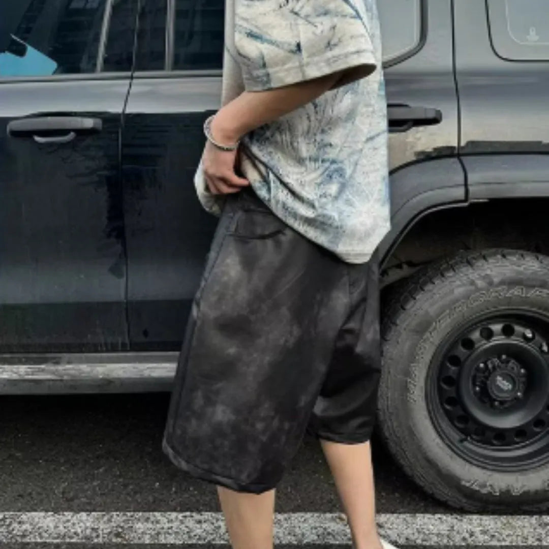 Korean loose-fit men's T-shirt with a full blue tie-dye print and short sleeves.