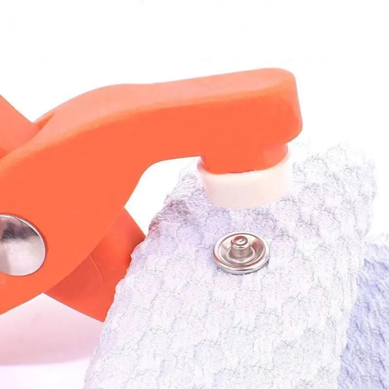 Stainless steel five-claw no-sew buttons and pliers for children's clothing.