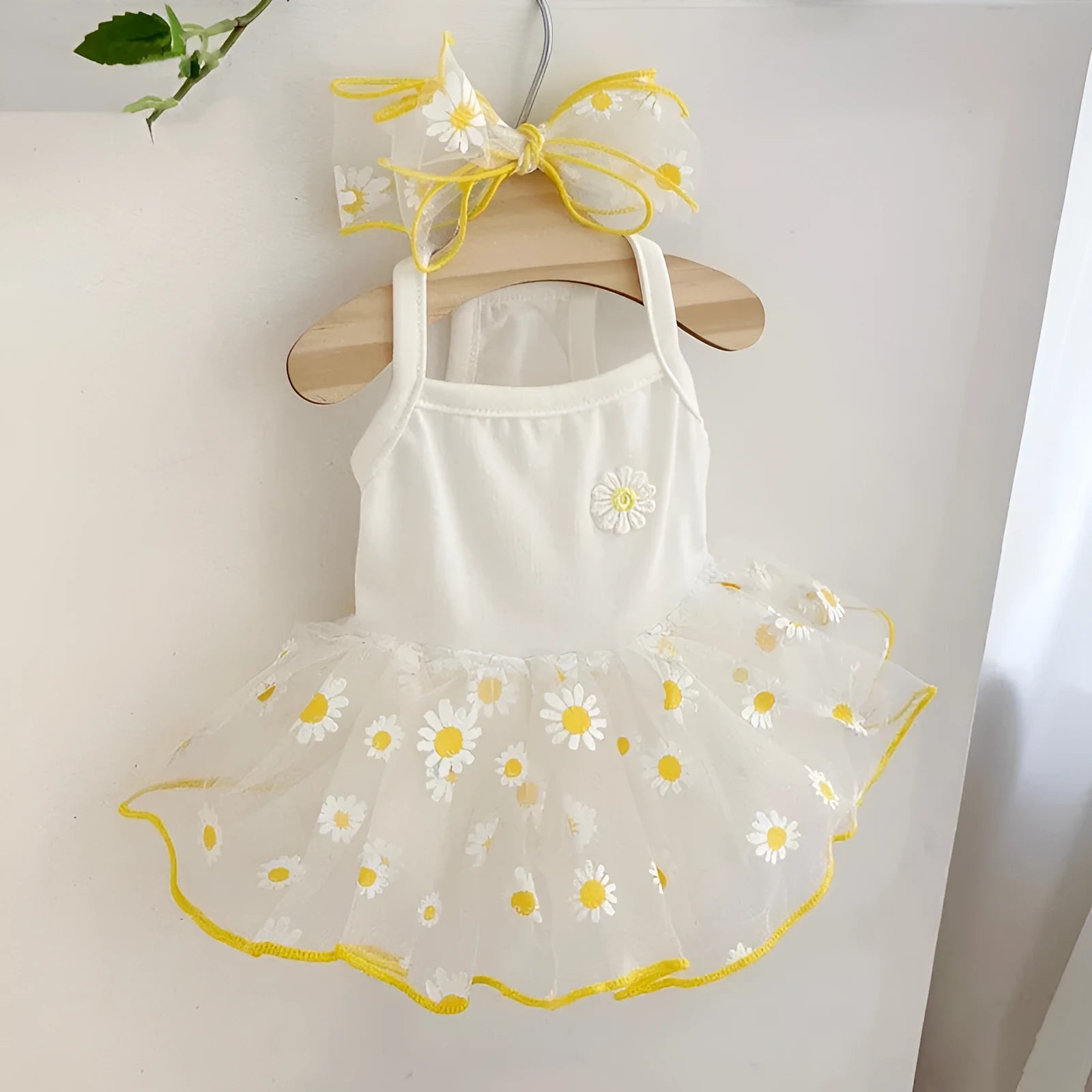 Yellow daisy print dog t-shirt on mannequin showing lightweight polyester summer pet clothing
