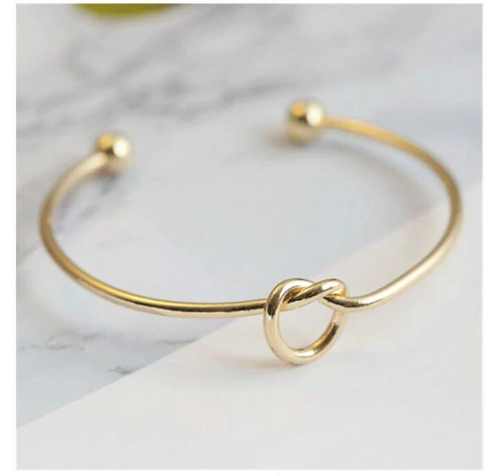 Knotted Knot O-Type Metal Openwork Bracelet in various colours, showcasing unique openwork design