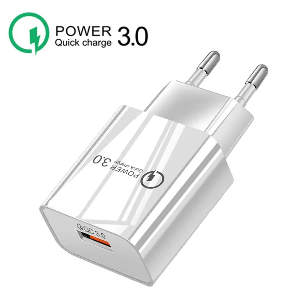 Folding three-in-one magnetic wireless charger in black with Type-C cable and EU plug on a desk