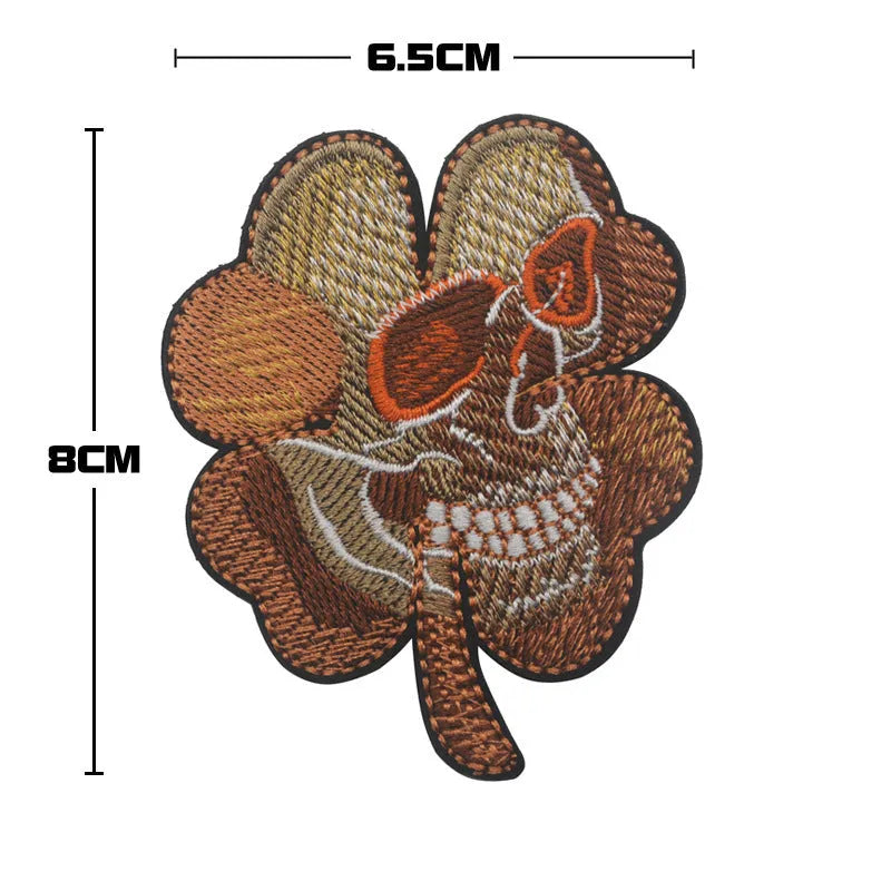 Embroidered fabric badge with hook and loop backing in military green colour for tactical gear attachment