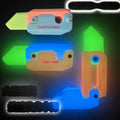 3D printed carrot gravity fidget knife in orange purple green colour, showing blade partly extended from sheath