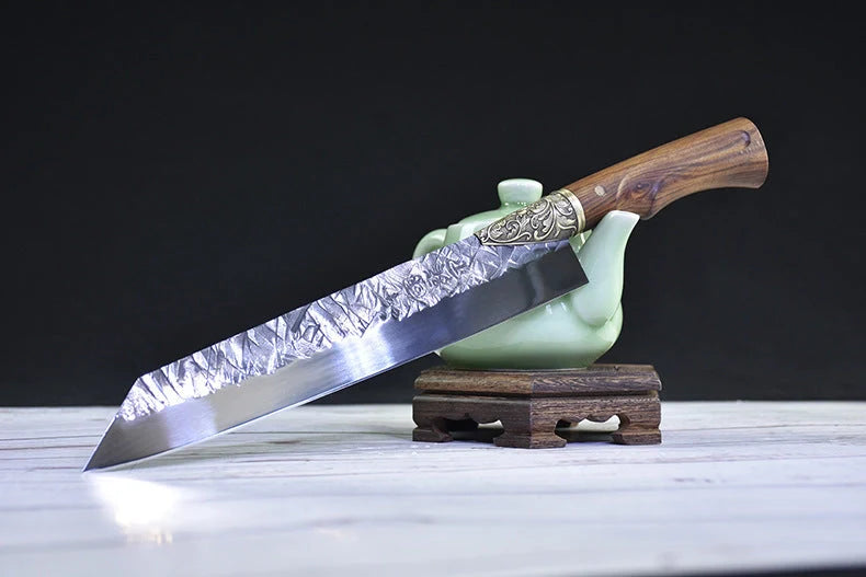 Hand-forged slicing knife with rosewood handle and leather case
