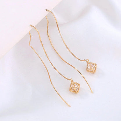 Gold Bronze Cutout Zircon Tassel Earrings with European design and sparkling accents