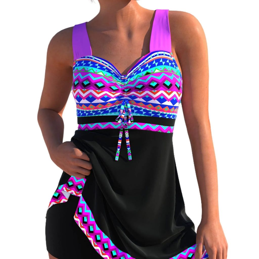 Plus size woman modelling a blue split skirt bikini swimsuit with backless design.