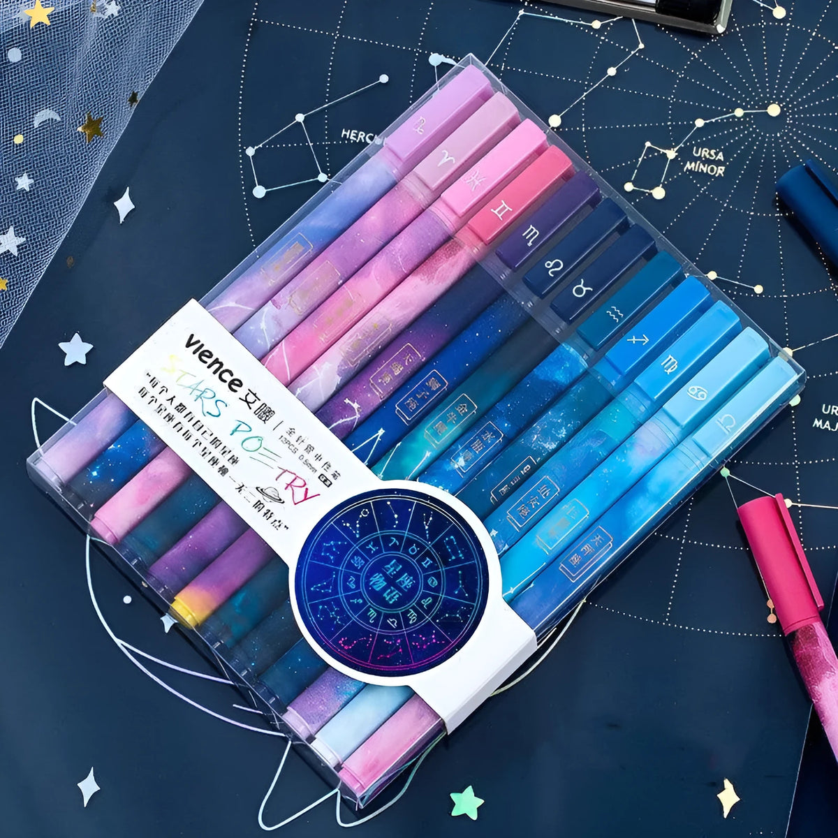 Set of twelve plastic ballpoint pens with different constellation and zodiac designs