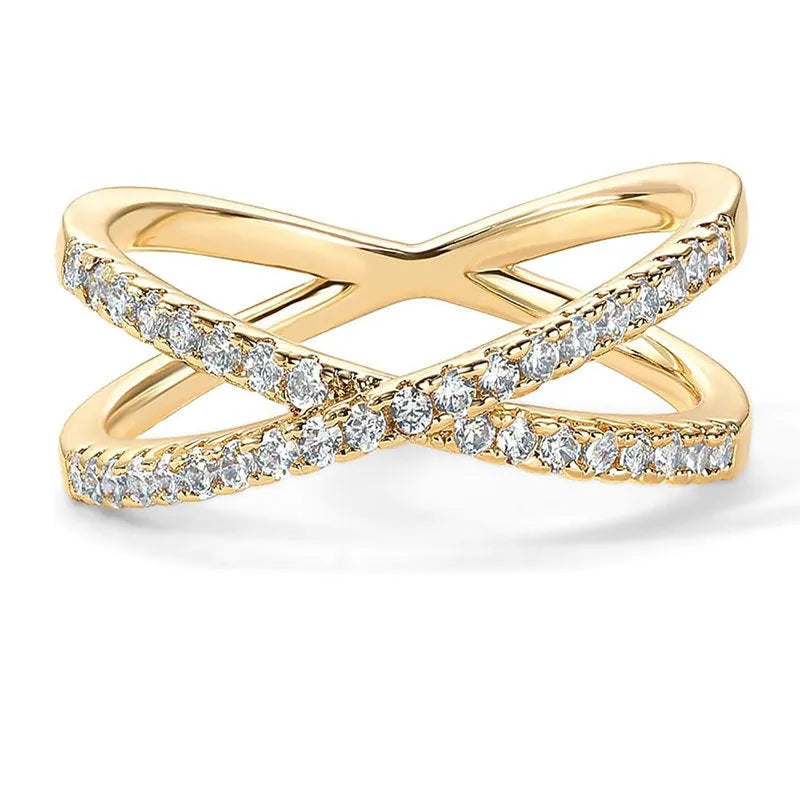 Silver cross ring with diamond accents in half circle wide band design on white background