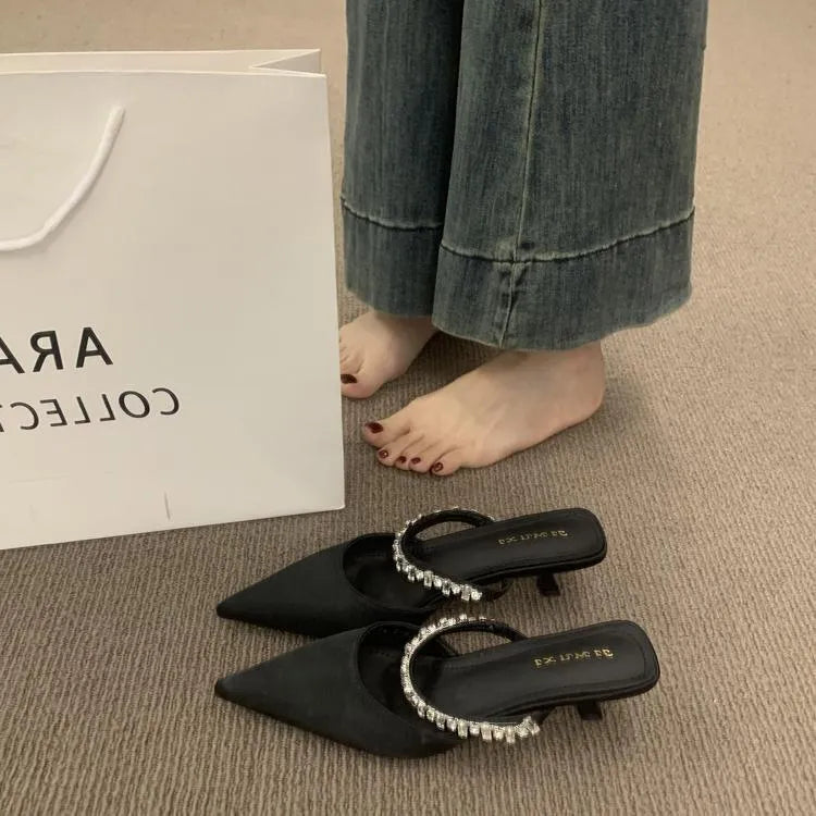 Black women's rhinestone pointed toe half slippers with suede upper and rubber sole
