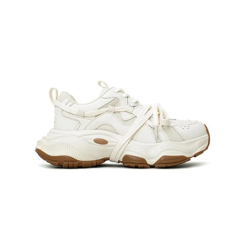 Women's milky white platform sneakers with lace-up front and round toe.