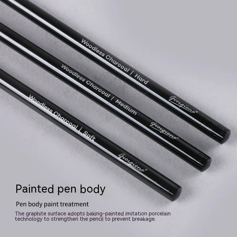 Set of graphite and carbonized drawing pencils with wooden barrels on suction card packaging