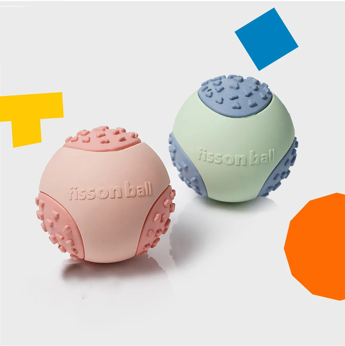 Green and pink rolling ball dog toy for small medium dogs measuring 64mm diameter