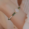 Olive green Hetian jade and copper bead bamboo joint bracelet with antique finish
