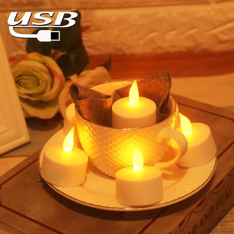 White plastic USB rechargeable LED candle lamp with flickering flame on plastic cup.