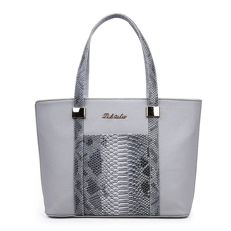Elegant women's shoulder bag with zipper and organised pocket in light grey, black, off-white, and rose red