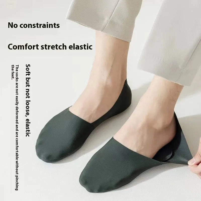 Men's solid colour cotton invisible socks showing non-slip grip on heel